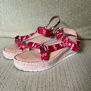 Nine West size 8 sandal. Wedge heel. Velcro strap.